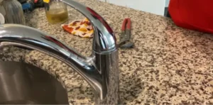 how to take a moen kitchen faucet apart